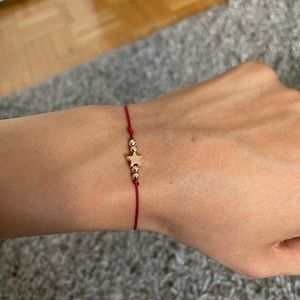 Hand made bracelet with gold beads and star stone